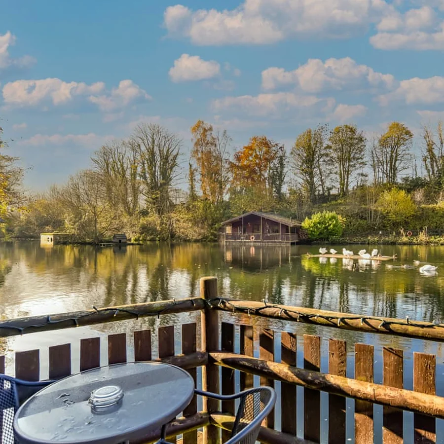 The lake at Herons Lake Retreat at dusk, Flintshire